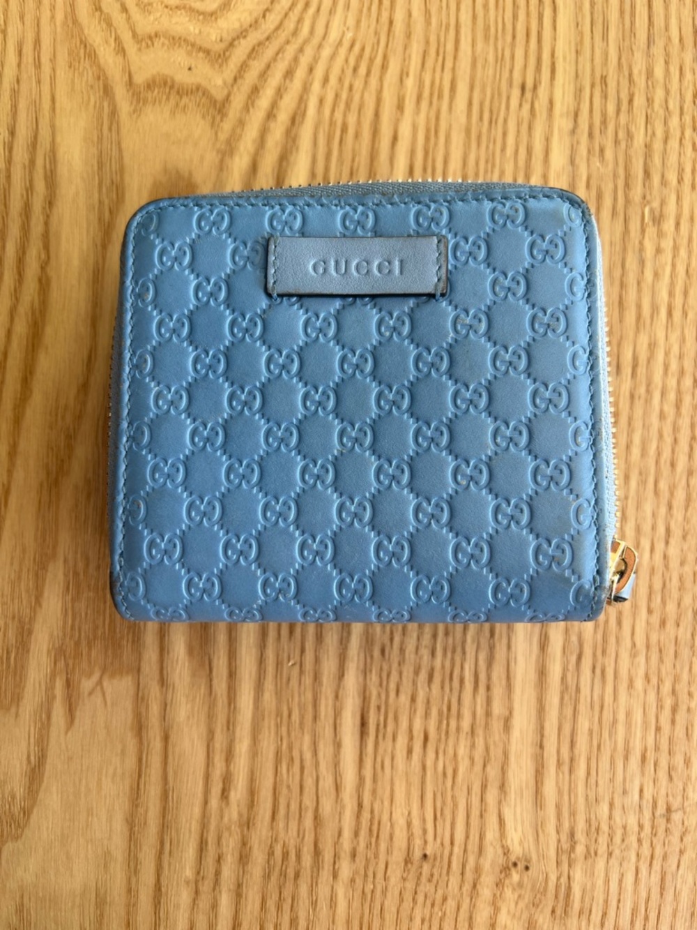 Gucci Powder Blue Embossed GG Zip-Around Wallet
